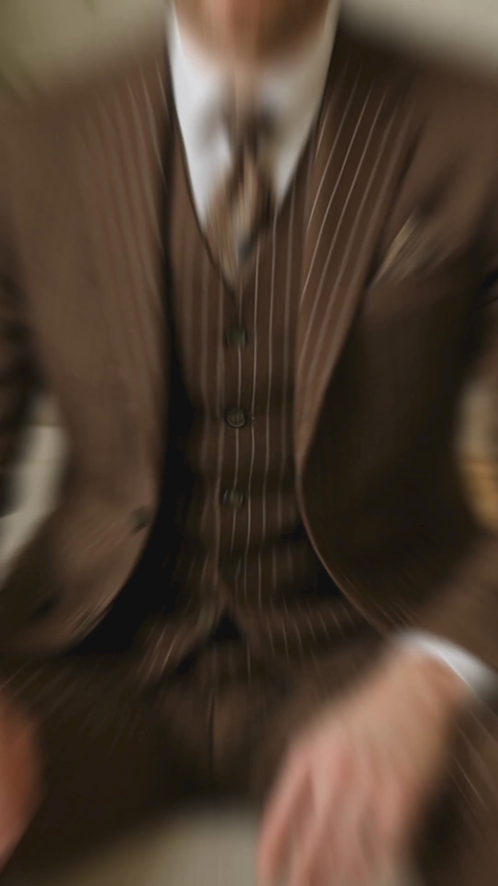 brown pinstripe suit